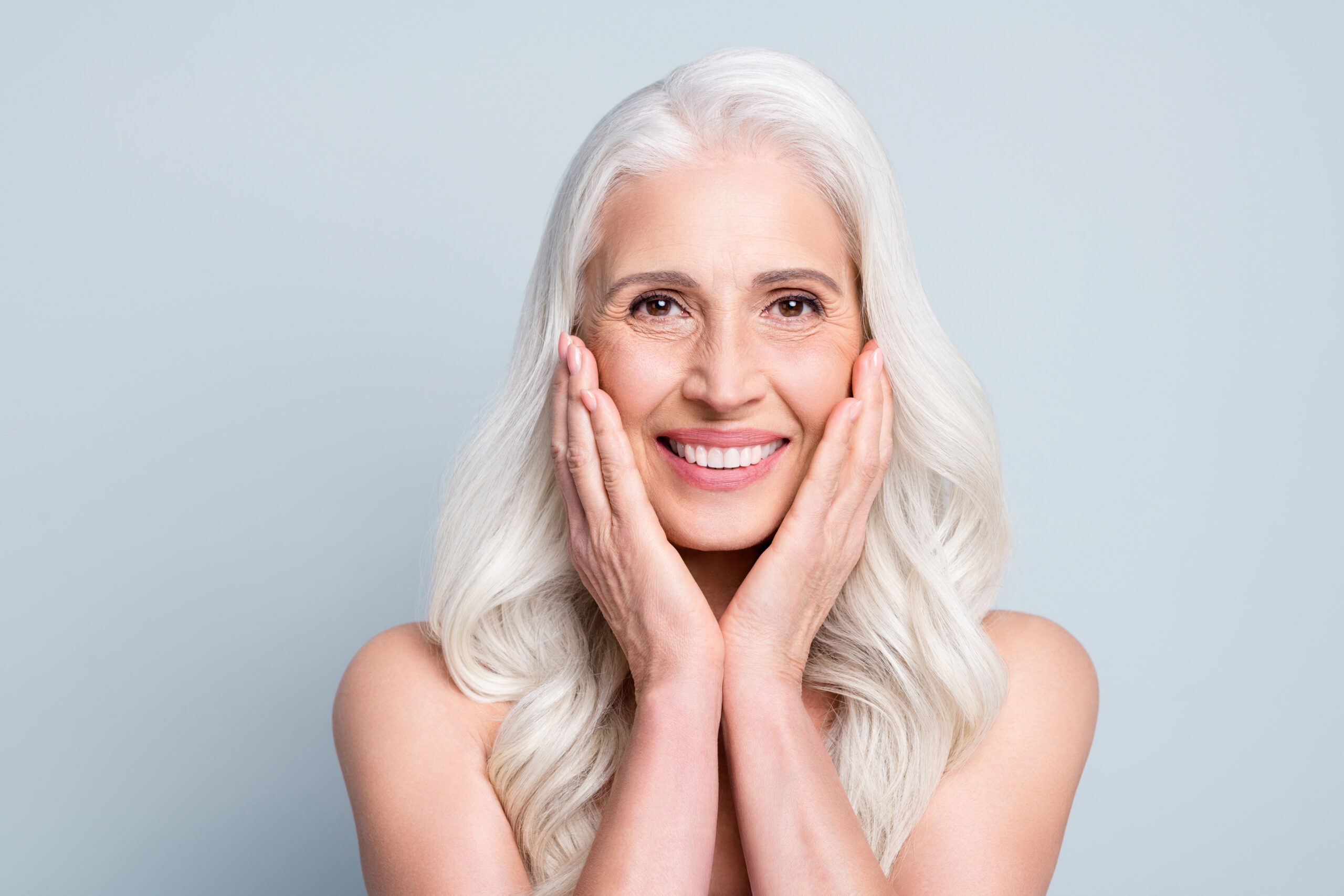 an image of a dental patient that received full mouth dental implants.