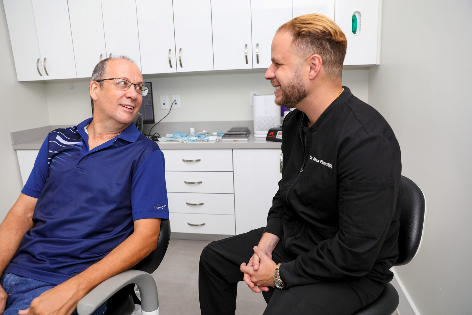 Dr Planes Discussing Options with Dental Implants Patient
